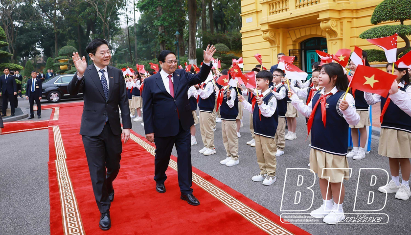 Thủ tướng Phạm Minh Chính chủ trì lễ đón Thủ tướng Singapore và Phu nhân